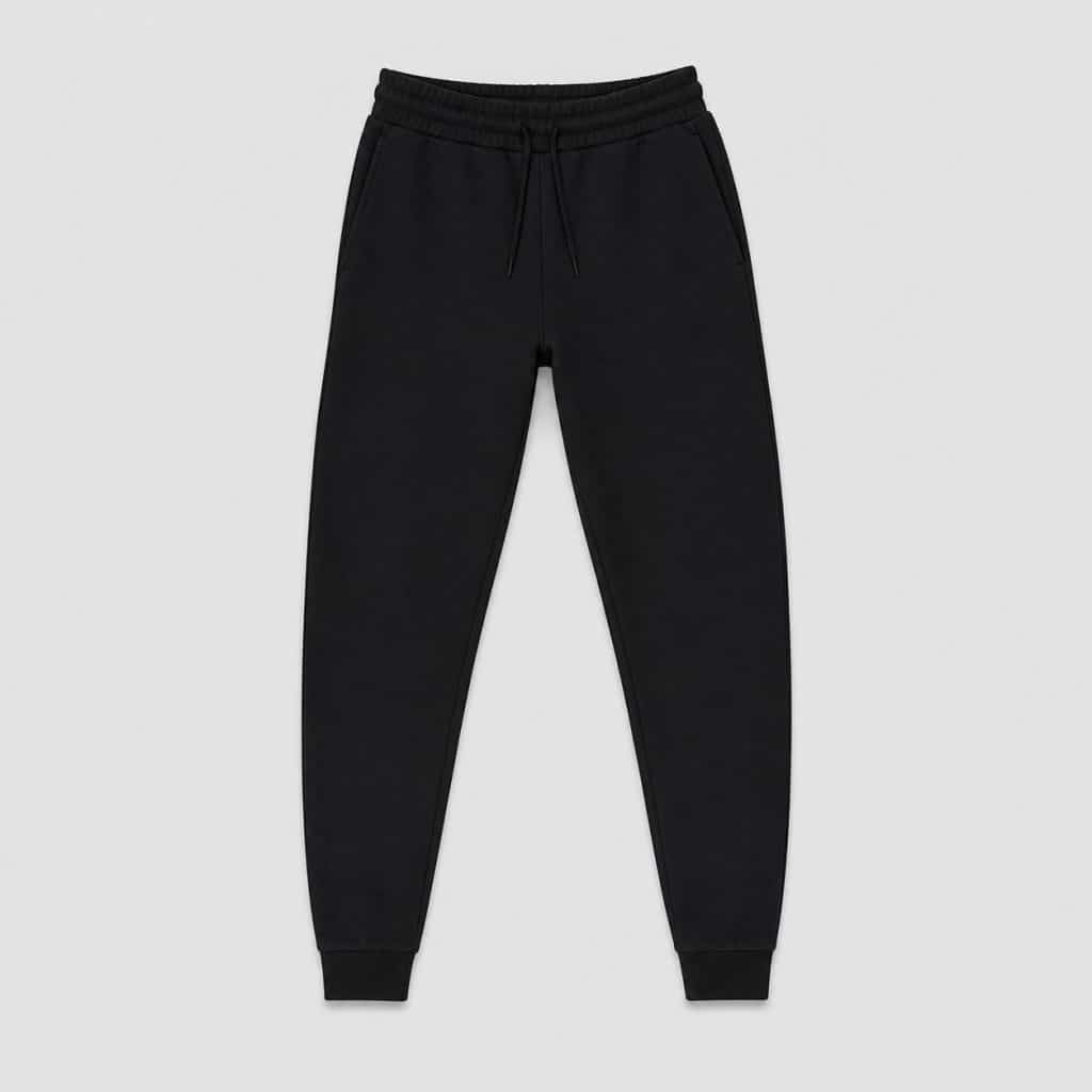 Jogging noir femme coupe slim présenté sur fond clair