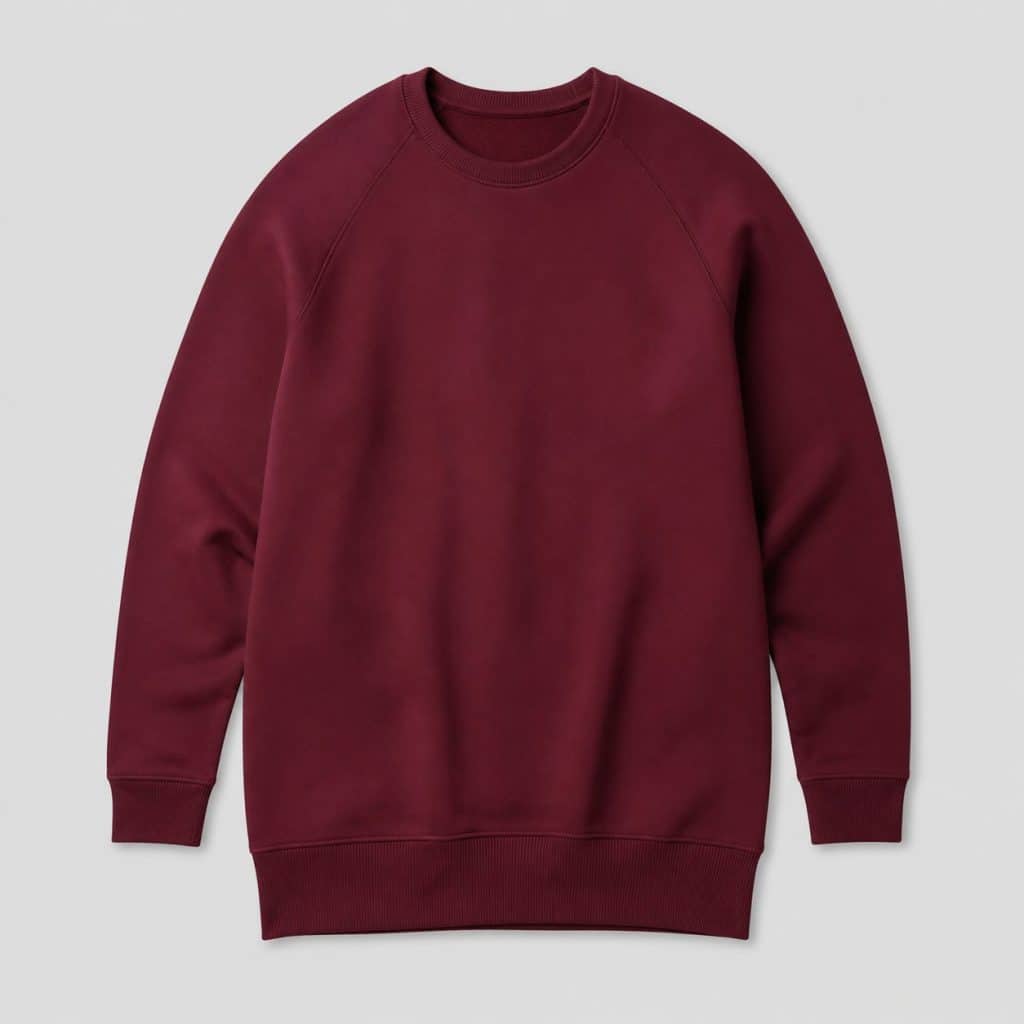 Sweat femme coupe longue bordeaux présenté sur fond clair
